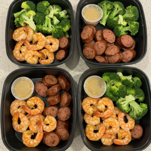 Shrimp, sausage, and broccoli meal prep containers.